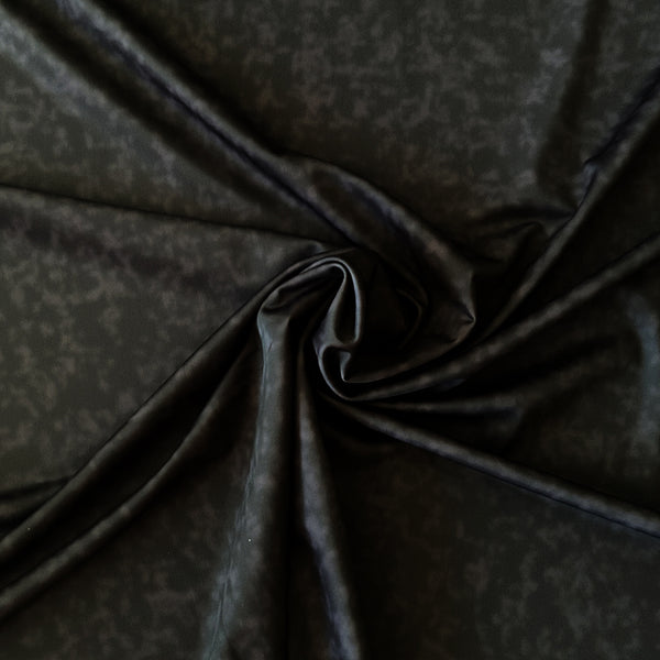 Tissu lycra noir goutte éclatée